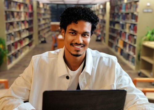 Male student in library