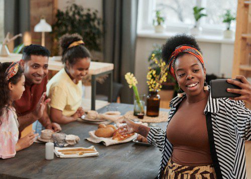 parents and 2 daughters in kitchen
