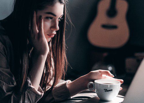 woman laptop with coffee