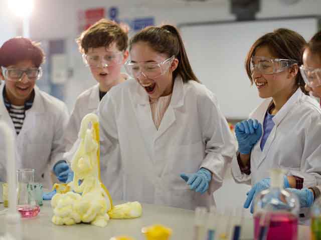 High school students in chemistry lab