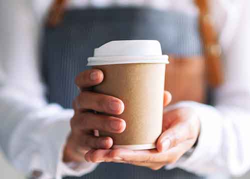 Coffee cup being served